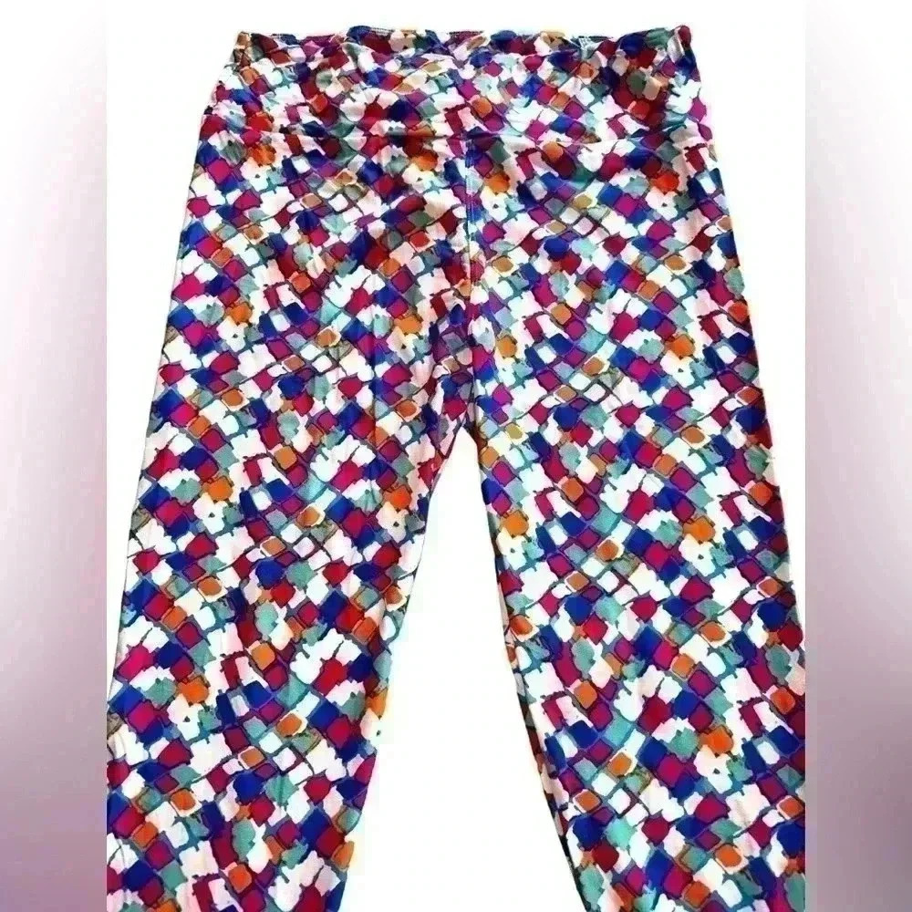 Lularoe TC white, turquoise, orange,pink,& royal blue geometric leggings.NWOT.